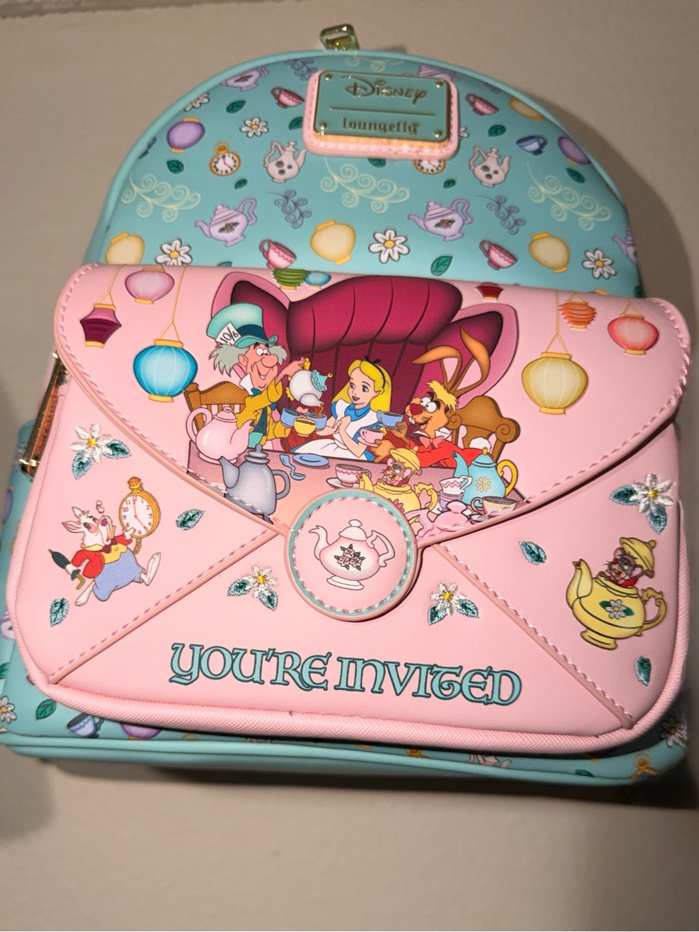 Loungefly pastel pink and teal Alice in Wonderland Tea Party Mini Backpack